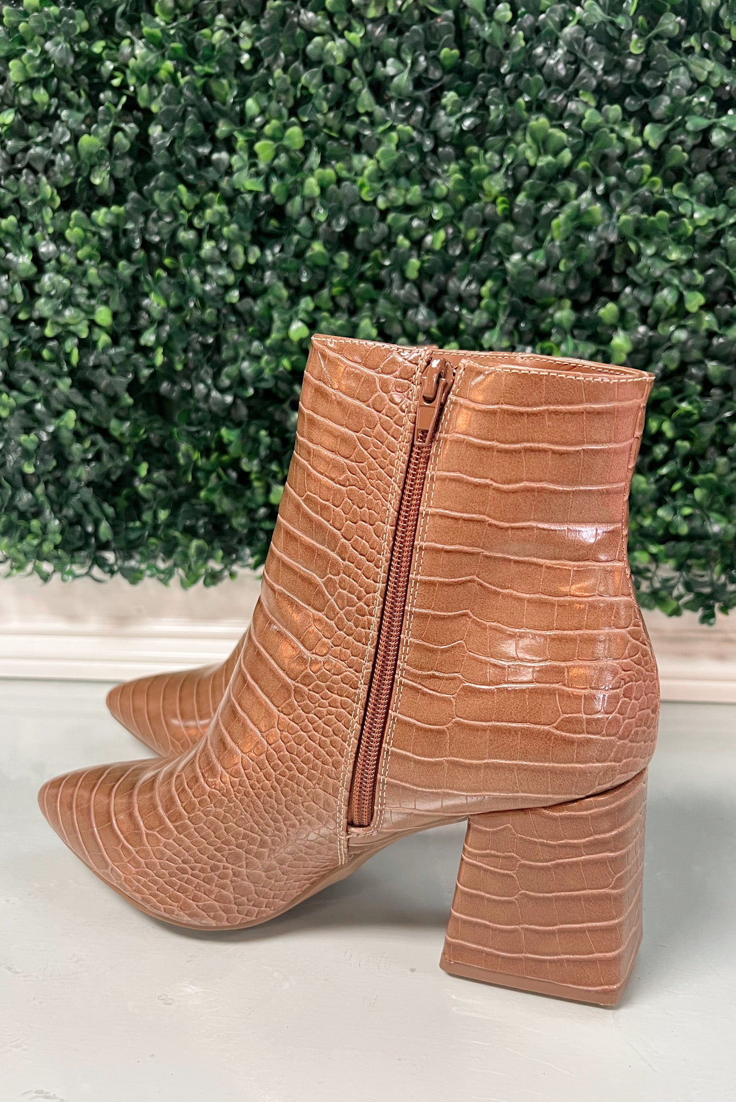 Brown faux crocodile ankle booties with zipper