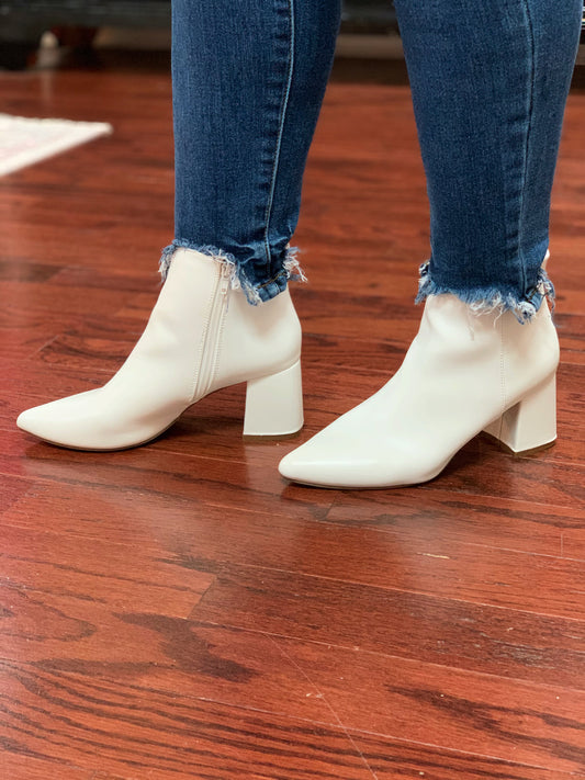 White block heel ankle booties with zipper