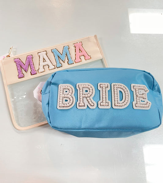 Tiffany blue zippered nylon pouch with the word 'bride' embroidered in white varsity letters on the outside of the pouch.